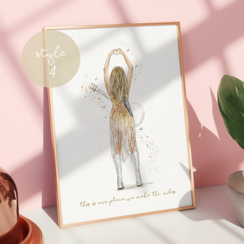 May include: A framed art print featuring a blonde figure in a gold fringe dress and white boots, seen from behind, making a heart shape with hands. A guitar is strapped to the back. The text reads style 4 and this is our place, we make the rules.