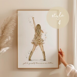 May include: Watercolor print of a woman singing, wearing a fringed dress and boots. The artwork includes musical notes and the text "just be yourself there is no one better." The print is in a wooden frame.
