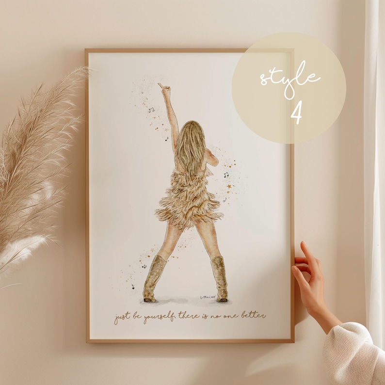 May include: Watercolor print of a woman singing, wearing a fringed dress and boots. The artwork includes musical notes and the text "just be yourself there is no one better." The print is in a wooden frame.