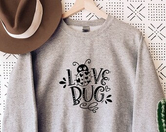 Sudadera de San Valentín con diseño de mariquita y corazón: diseño de bichito enamorado.