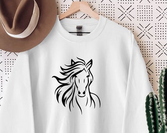 May include: White sweatshirt with a black silhouette of a horse's head.
