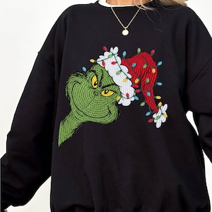 Grinch Christmas Lights Sweatshirt, Holiday Grinchmas Hoodie, Grinch Santa Hat Xmas Sweatshirt, Merry Christmas 2025 Feeling Extra Grinch