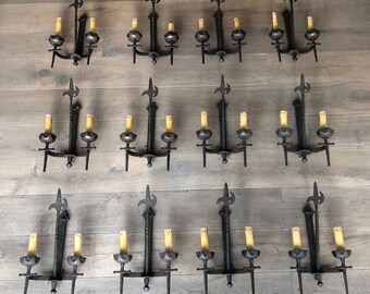 Rare Suite of 12 Important Wrought Iron Wall Lamps