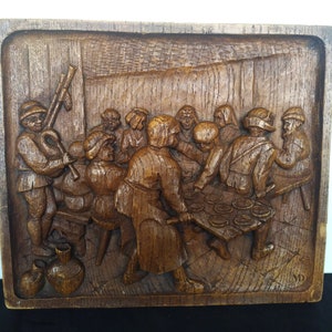 Breughelian scene executed in limestone as a wall hanger, wall plate, wall decoration, After a painting by Breughel