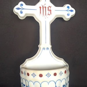 Holy water font, Benetier, Lourdes souvenir, in three-colored porcelain, Blessing of Christian people. Wall decoration. Marked I H S, Jesus