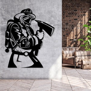 May include: Black and white silhouette of a firefighter holding an axe. The firefighter is wearing a helmet and a gas mask. The silhouette is mounted on a gray wall.