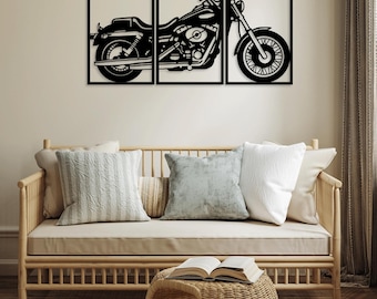May include: Black metal wall art featuring a motorcycle silhouette in three separate frames. The motorcycle is a classic cruiser style with a large front wheel and a long, low profile.