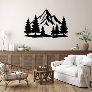 May include: Black metal wall art featuring a mountain range and fir trees. The silhouette design is mounted on a white wall, creating a striking contrast. This nature-themed decor adds a touch of the outdoors to any interior space.