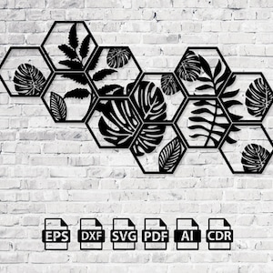 May include: A set of six black metal hexagon wall decor pieces with cut-out tropical leaf designs. The pieces are arranged in a staggered pattern.