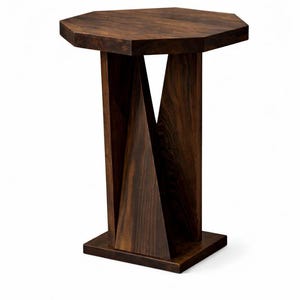 Studio view of dark rustic modern geometric side table, freestanding narrow side table with textured wood grain.