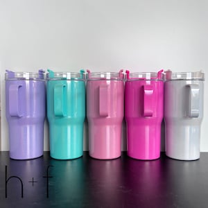 May include: Five stainless steel tumblers with lids and handles. The tumblers are in various colors: lavender, teal, pink, hot pink, and silver.