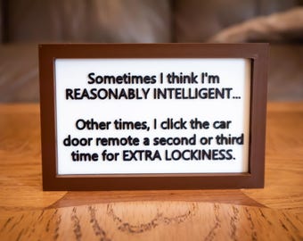 Funny Desk Sign: "Sometimes I think I'm REASONABLY INTELLIGENT..."