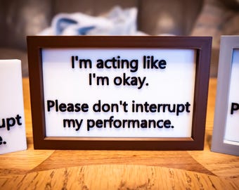 Funny Desk Sign: "I'm acting like I'm okay. Please don't interrupt my performance."