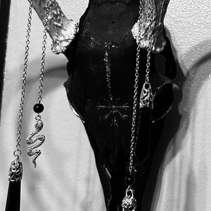 Assorted black pendulums