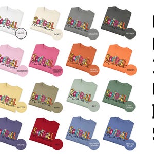 K&ouml;nnte beinhalten: Ein Grafik-T-Shirt-Design mit dem Text "Softball Mama" mit einem bunten Softball und anderen dazugeh&ouml;rigen Bildern. Das Shirt ist in 16 verschiedenen Farben erh&auml;ltlich, darunter Wei&szlig;, Elfenbein, Granit, Pfeffer, Bl&uuml;te, Crunch Berry, Burnt Orange, Melone, Butter, Khaki, Bay, Hellgr&uuml;n, Traube, Rot, Washed Denim und Mystic Blue.