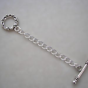 Cadena de extensión con cierre de palanca y flor redonda para collar o pulsera, alargador de cadena, extensor de cadena de plata tibetana