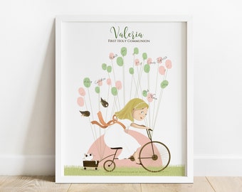 May include: A white frame with a print of a girl riding a pink bicycle with balloons and birds. The balloons have names written on them. The text at the top of the print reads "Valeria First Holy Communion".