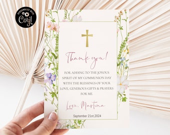 May include: A white thank you card with a gold cross and floral border. The text reads "Thank you! For adding to the joyous spirit of my communion day with the blessings of your love, generous gifts & prayers for me. Love, Martina September 21st, 2024".