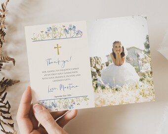 May include: A white thank you card with blue flowers and a gold cross. The text reads "Thank you! For adding to the joyous spirit of my first Holy Communion with your presence, prayers and generous gifts. Love, Martina. September 21st, 2004".