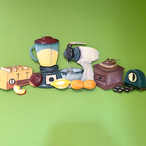 May include: A colorful kitchen themed wall art piece featuring a blender, mixer, coffee grinder, toaster, and fruit. The art is painted on wood and has a rustic, vintage style.