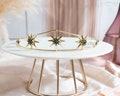 Simple and elegant bridal tiara of light gold color stars inlaid with emerald green crystal, Stunning gold stars Tiara for celestial wedding product logo