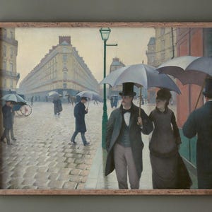 Paris Street Rainy Day by Gustave Caillebotte 1877. Remastered wall art. Available as canvas or fine art print