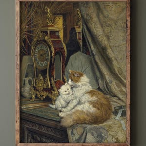 May include: A framed vintage painting depicts a fluffy orange and white cat cuddling a white kitten. A decorative clock and ornate furniture are in the background. The artwork is set in a room with patterned curtains and a detailed wooden frame.