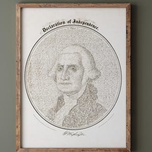 May include: A framed print of a portrait of George Washington, made up of the text of the Declaration of Independence. The title "Declaration of Independence" is at the top of the print, and the signature "G. Washington" is at the bottom.