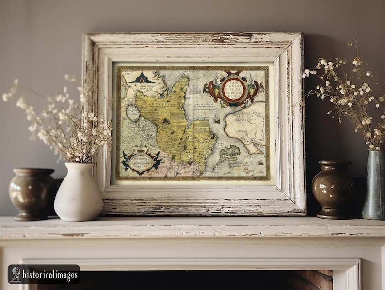 May include: Framed antique map print with a distressed white wooden frame. The map features detailed illustrations and a vintage aesthetic. The frame is rectangular and sits on a white mantelpiece, with vases and dried flowers on either side.