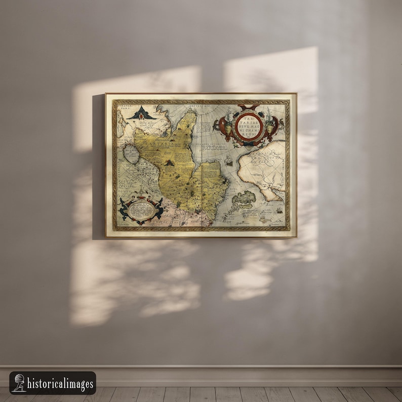 May include: A framed antique map with a detailed depiction of a historical region. The map features a cream-colored background with intricate illustrations in shades of yellow, brown, and blue. The frame is a warm gold color, adding to the vintage aesthetic.