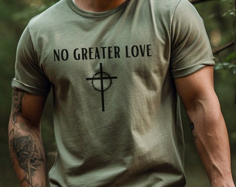 May include: A green t-shirt with the text "NO GREATER LOVE" and a cross with a crown of thorns.