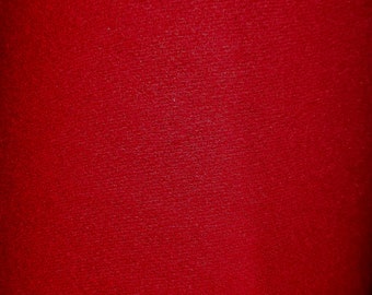 Peut inclure: Gros plan sur un tissu rouge uni avec une surface texturée.