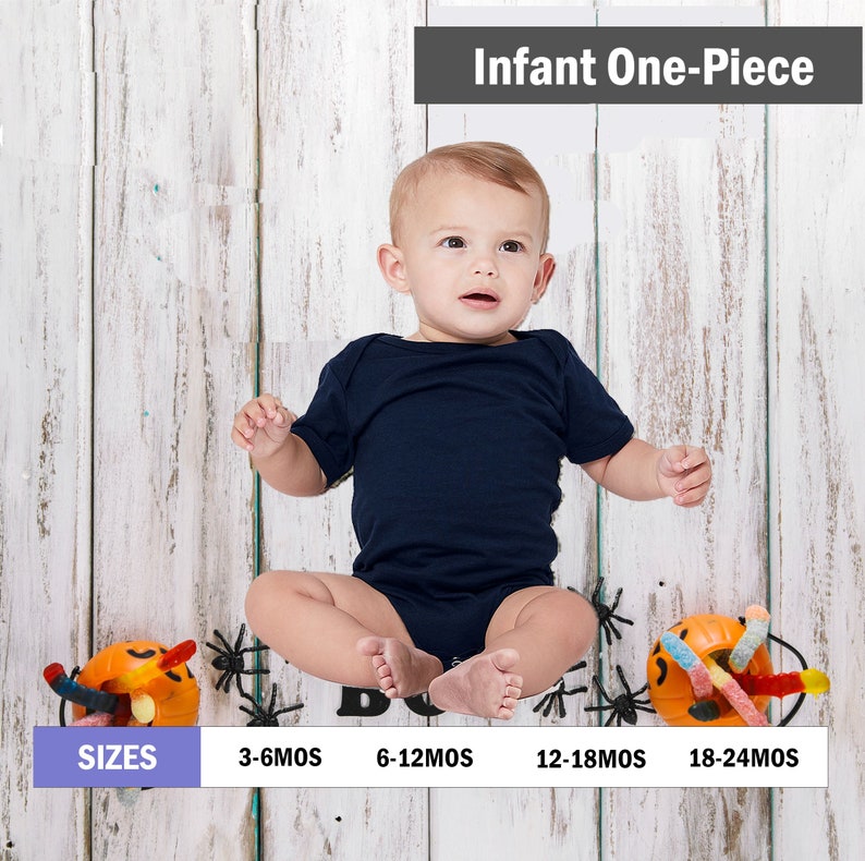 May include: A baby wearing a dark blue infant one-piece on a white wood background. The baby is sitting with legs crossed and is looking up. The image includes the text "Infant One-Piece" and a size chart with the following sizes: 3-6MOS, 6-12MOS, 12-18MOS, 18-24MOS.