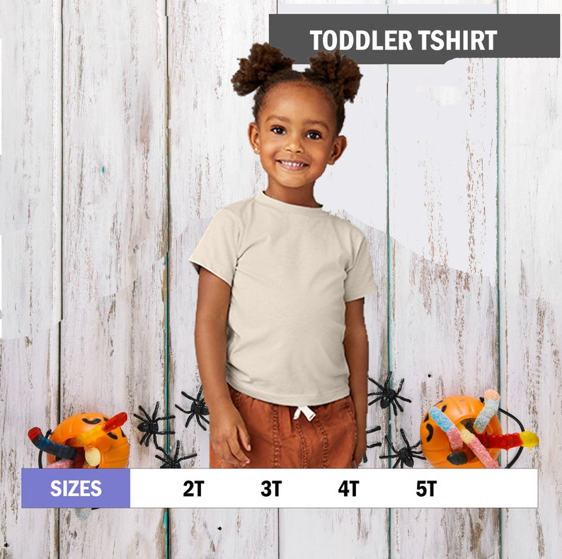 May include: A white toddler t-shirt with a crew neck and short sleeves. The t-shirt is available in sizes 2T, 3T, 4T, and 5T.