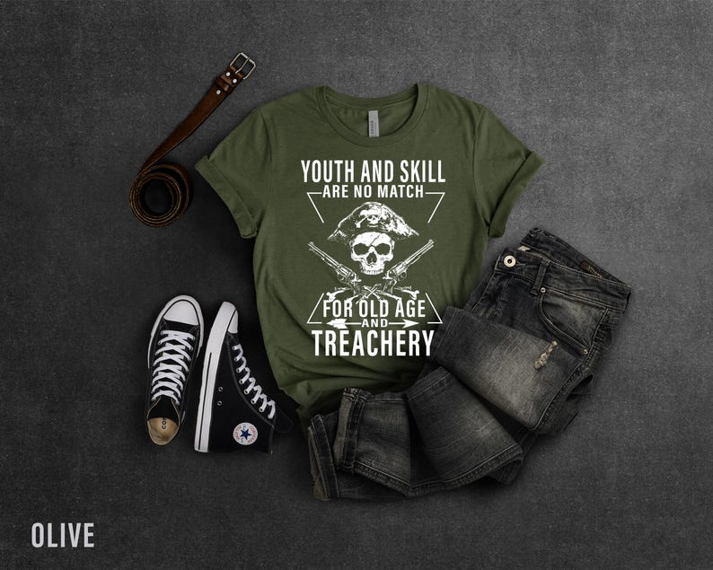 May include: Olive green t-shirt with a white skull and crossbones graphic. The graphic says "Youth and Skill Are No Match For Old Age and Treachery".