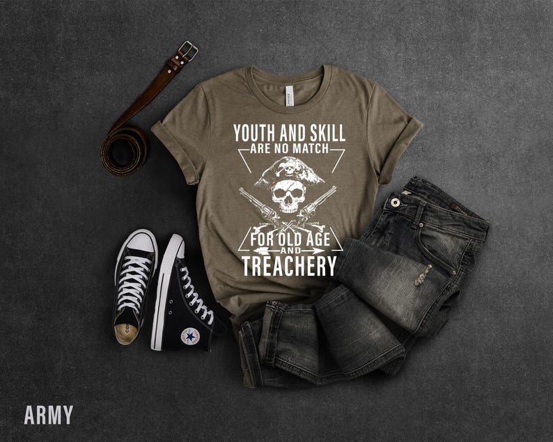 May include: A brown t-shirt with a white graphic design featuring a skull with crossed pistols and the text "Youth and Skill Are No Match For Old Age and Treachery".
