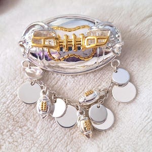 Vintage 1980s Football Brooch: Silver & Gold Dangling Charms