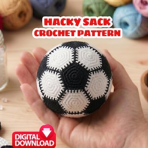 May include: A handmade crochet hacky sack in black and white, held in a hand. The soccer ball-shaped toy is surrounded by yarn, a jar of beads, and the text "HACKY SACK CROCHET PATTERN" and "DIGITAL DOWNLOAD".