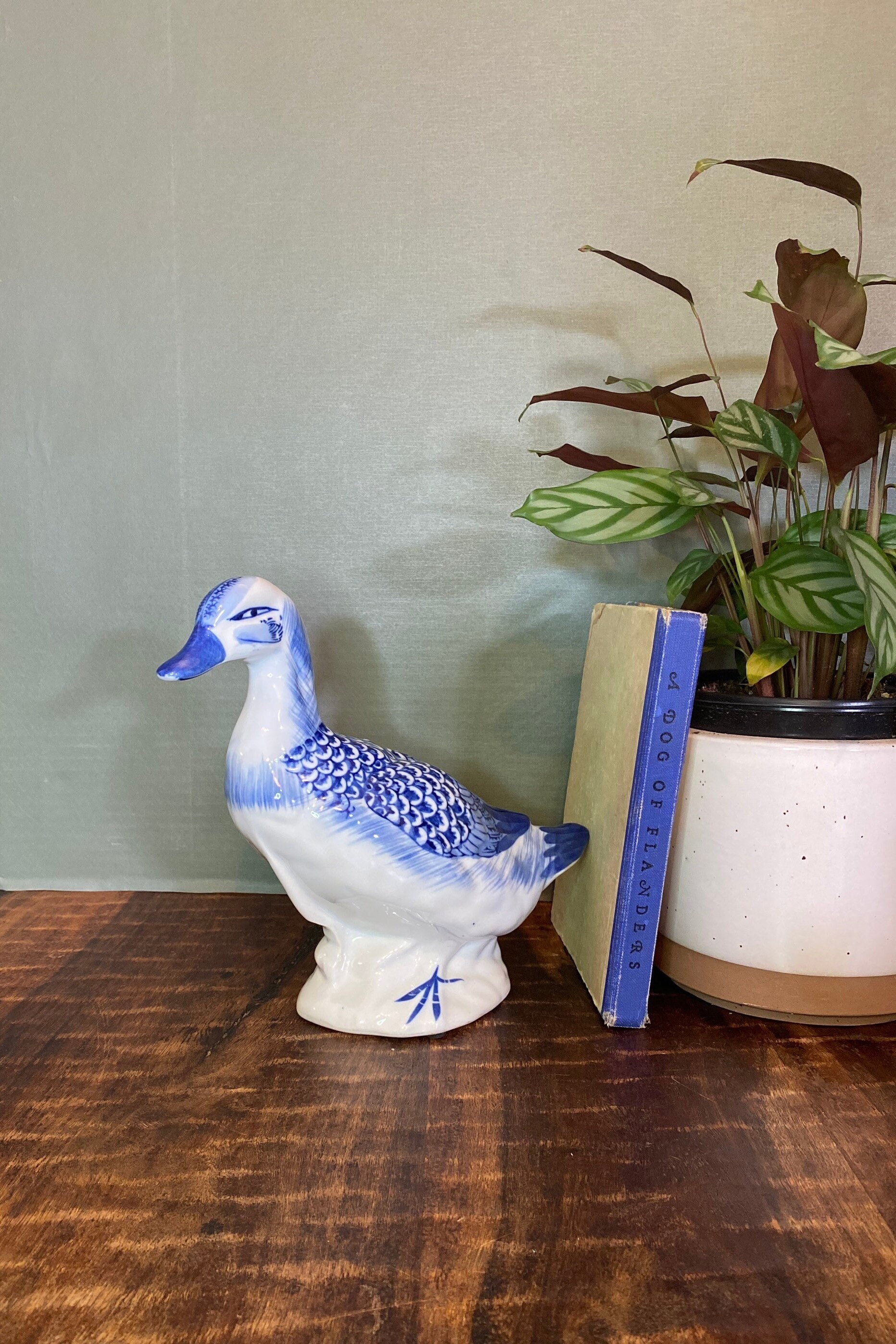 Blue and white ceramic duck