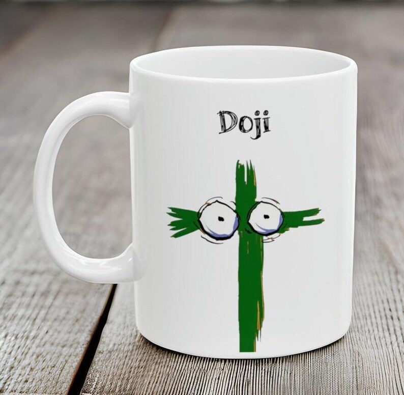 May include: White ceramic mug with a whimsical green cross design featuring cartoon eyes and the word "Doji" in black script. The mug has a curved handle and is suitable for hot or cold beverages.