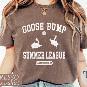 a woman wearing a goose bump t - shirt