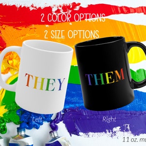 May include: Two 11 oz mugs with the words "THEY" and "THEM" in rainbow colors. The mug on the left is white and the mug on the right is black.