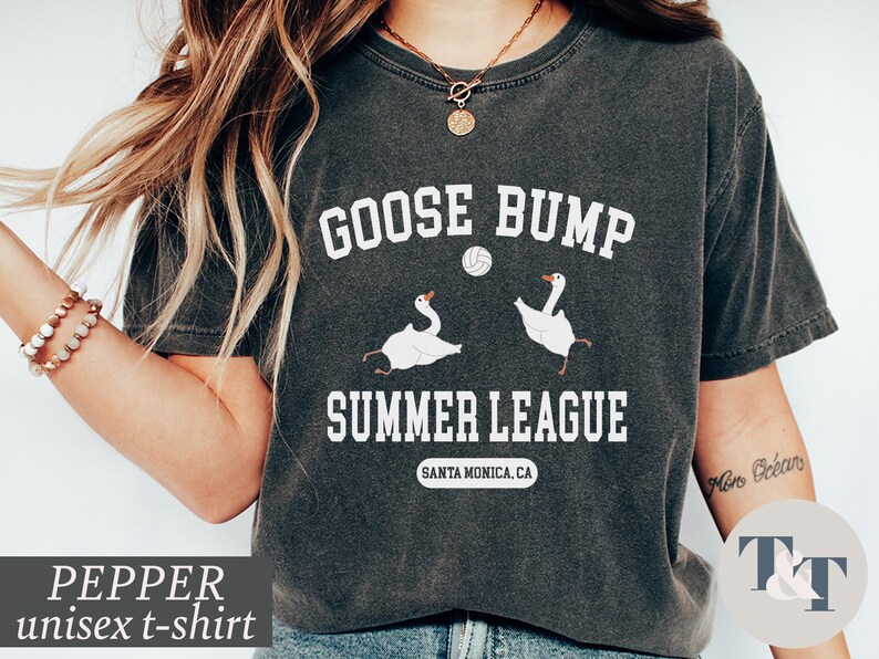 a woman wearing a goose bump t - shirt