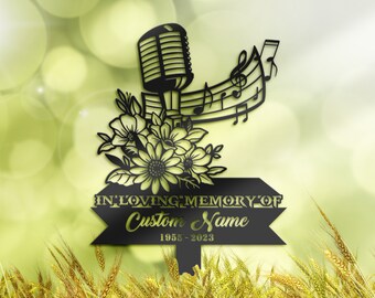 May include: Black metal memorial garden stake with a microphone, musical notes, and flowers. The stake has a sign that reads "In Loving Memory of Custom Name 1955-2023".