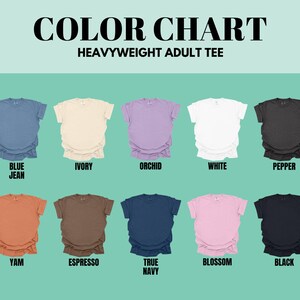 Color chart for a heavyweight adult tee, featuring various t-shirt colors such as blue jeans, ivory, orchid, white, pepper, yam, espresso, true navy, and black.