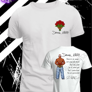May include: White t-shirt featuring a bouquet of red roses and the text "Dear Mama". The back of the shirt displays an illustration of a person with a tattoo and the text "Dear Mama".