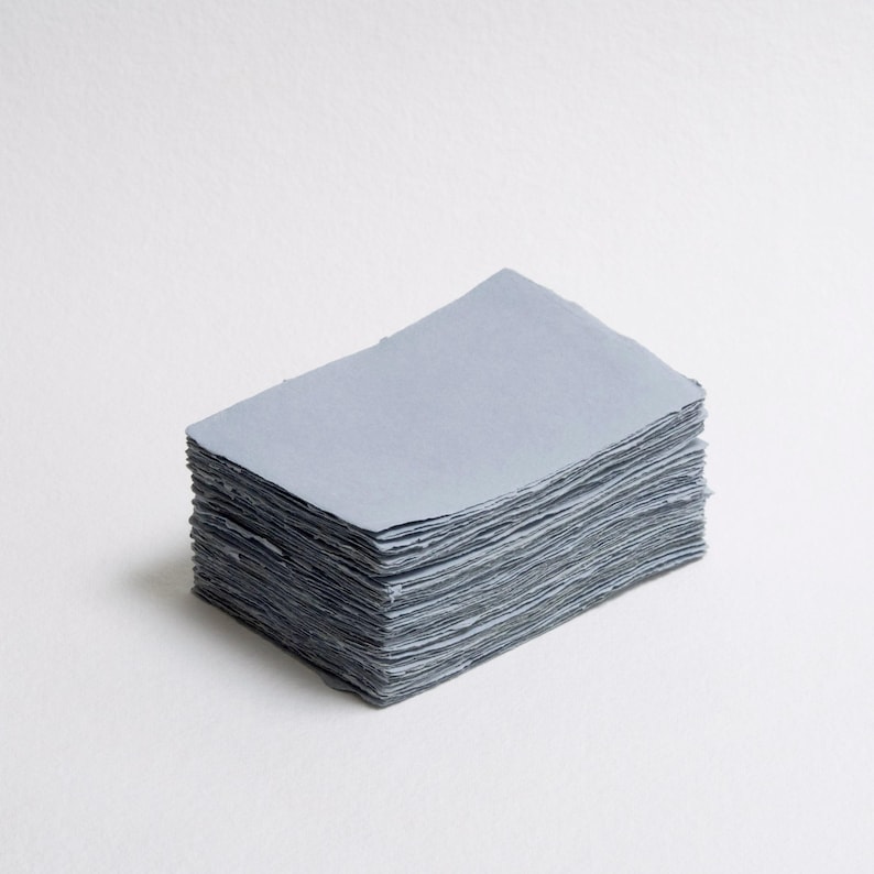 Beautiful handmade cotton envelopes in dusty blue with natural deckle edges.  Perfect for calligraphy, digital printing, letterpress, stationery design, and watercolour, although the possibilities are endless. With natural, delicate, and feathery ...