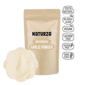 May include: A tan pouch of Naturzo dehydrated garlic powder with a pile of garlic powder in front. The pouch has text that reads "Dehydrated Garlic Powder". Additional labels state "100% Natural", "No Added Sugar", "Vegan", "Lactose Free", "Gluten Free", and "GMO Free".