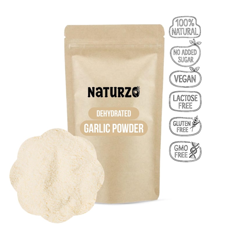 May include: A tan pouch of Naturzo dehydrated garlic powder with a pile of garlic powder in front. The pouch has text that reads "Dehydrated Garlic Powder". Additional labels state "100% Natural", "No Added Sugar", "Vegan", "Lactose Free", "Gluten Free", and "GMO Free".