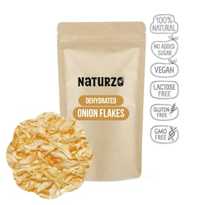 May include: A package of Naturzo dehydrated onion flakes. The tan bag features the brand name and product description. A pile of dried onion flakes sits in front of the bag. The bag also has labels indicating the product is 100% natural, vegan, and gluten-free.